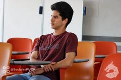young student attentively listening in class