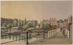 City boatyard seen westwards towards the back houses on the Amstel River next to the Stadstimmertuin garden in Amsterdam