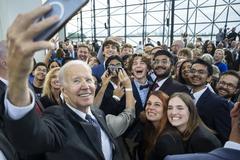 President Joe Biden greeting guests at the John F. Kennedy Presidential Library during Cancer Moonshot remarks