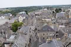 Panoramic view of Dinan, a historic medieval town in France with stone buildings and a river