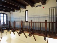 Interior of the Museum of Warsaw with historical exhibits and wooden architectural elements