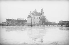 Historic view of Plac Łukiski in Vilnius featuring the Church of Saints Philip and James in the background