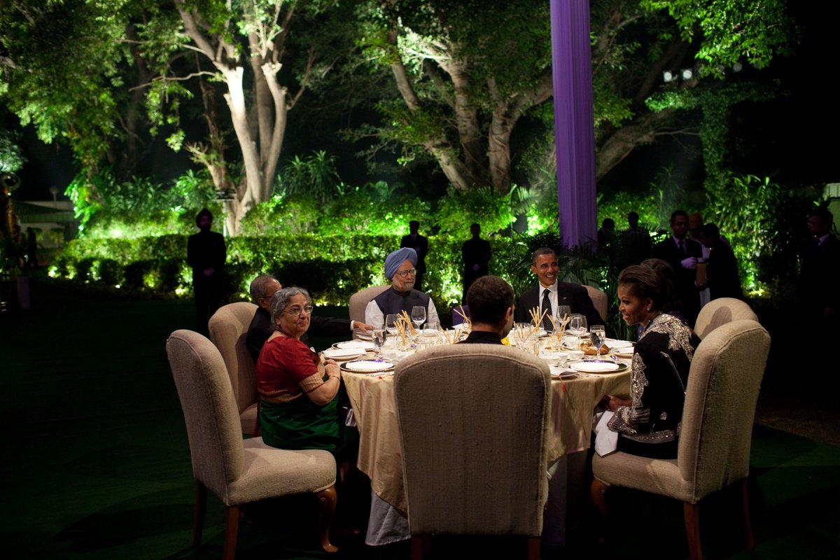President Barack Obama and First Lady Michelle Obama attending a dinner hosted by Prime Minister Manmohan Singh and Mrs. Gursharan Kaur at the Prime Minister's residence in New Delhi in 2010