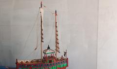 Traditional Indonesian wooden boat Kapal Beratap Papan at Museum Bahari