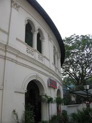 Exterior view of Singapore Art Museum building with modern architecture and blue sky