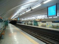 Metro station Jardim Zoológico in Lisbon interior platform view with stairs and escalator