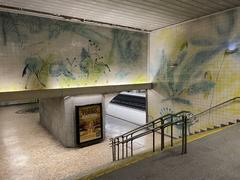 Blue and white azulejo tile panels by Júlio Resende at Jardim Zoológico metro station Lisbon