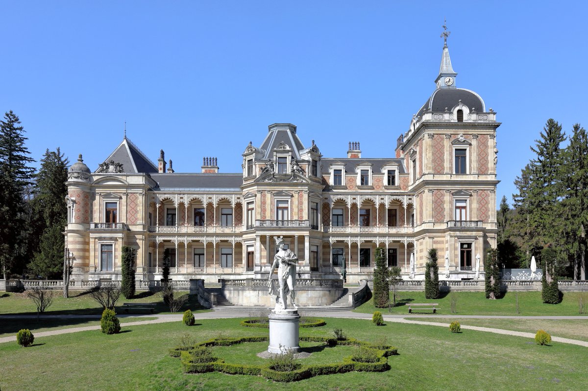 Hermesvilla palace in Vienna Austria surrounded by trees