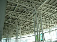 Seoul Railroad Station with trains and tracks under a large roof structure