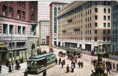 Historic street scene at Market and Geary streets in San Francisco with fountain and Palace Hotel, 1915