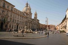 Piazza Navona crowded with people and historic buildings in Rome