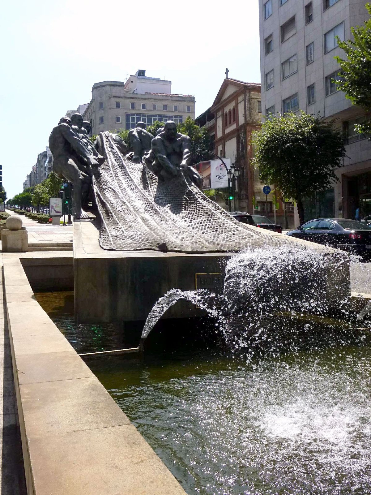 Monumento al Trabajo sculpture in Vigo depicting workers in action