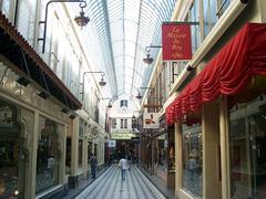 Covered shopping arcade Passage Jouffroy in Paris with glass roof and vintage architecture