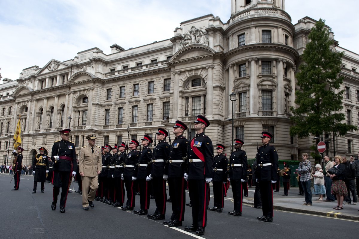 Chairman of the Joint Chiefs of Staff Adm. Mike Mullen reviewing British troops during a welcoming ceremony on Horse Guards Avenue, London, June 10, 2011