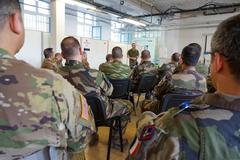 Military personnel conducting Joint Air-Ground Integration Center (JAGIC) training in Lille, France, coordinating air and ground operations