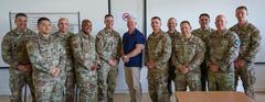 Military personnel engaging in Joint Air-Ground Integration Training at a coordination center in Lille, France
