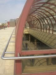 Hurka metro station platform with blue and white tiled walls and yellow lines on the floor