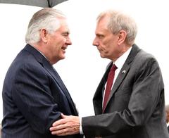 U.S. Secretary of State Rex Tillerson shaking hands and bidding farewell to U.S. Ambassador Robert F. Godec at Nairobi airport