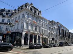Entrance of Avenue Louise in Brussels with street signs and buildings
