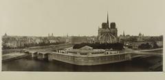 Panoramic view of the east tip of Île de la Cité in Paris, showcasing the Seine river, Notre-Dame Cathedral, Panthéon, Saint-Sulpice church, and Sainte-Chapelle
