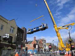 Waterloo & City Line train being lifted by crane