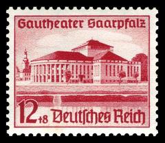 Grand opening of Theater Saarpfalz in Saarbrücken with large crowd and decorations