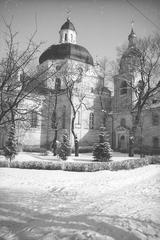 Vintage black and white photograph of the Vilnia River with Rosy and Visycki buildings including the Church of the Sacred Heart of Jesus at the Visitation monastery