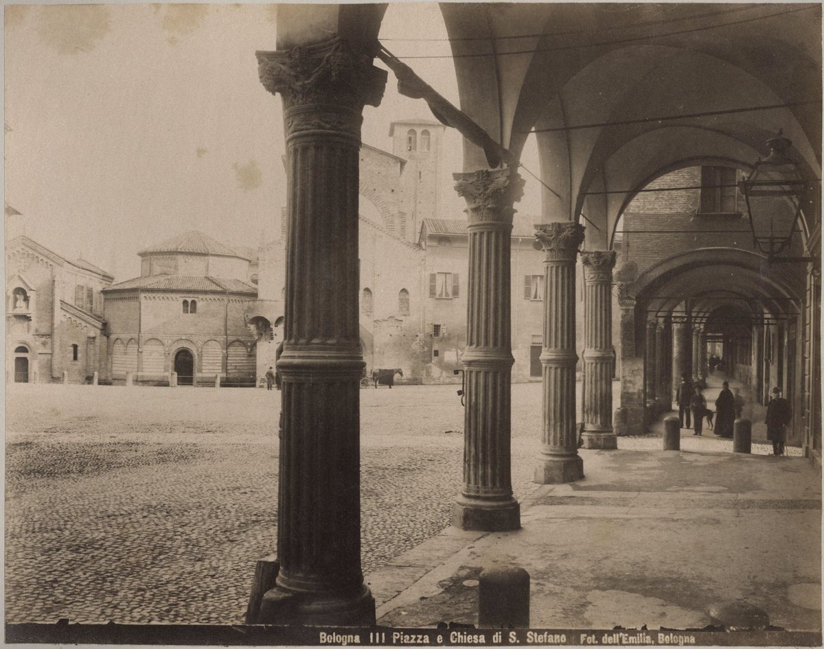 Historic San Stefano square and church with colonnade and people in Bologna, Italy circa 1870-1890