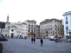 View of Piazza Farnese in Rome with historic buildings and clear sky