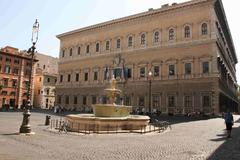 Palazzo Farnese facade in Rome under clear blue sky