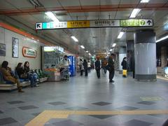 Express Bus Terminal Station platform with passengers and buses