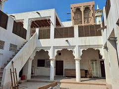 Traditional architecture of Al Bastakiya neighborhood in Dubai with narrow streets and wind towers