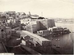 Historical view of Marsa Muscetto Harbour in Malta with windmill and Ponsonby's Column