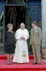 President Ronald Reagan and Nancy Reagan visit with Pope John Paul II at The Vizcaya Museum Miami Florida in 1987