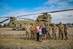 Soldiers from 16th Combat Aviation Brigade and Australian civilians near CH-47 Chinook helicopter at Port of Gladstone during Exercise Talisman Sabre 23