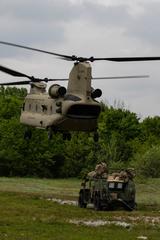 CH-47 Chinook helicopter departing after sling-cut on Army Ground Mobility Vehicle during Immediate Response 19 exercise in Croatia