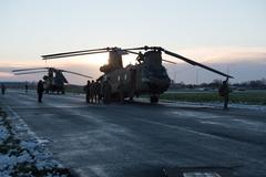 Crew of U.S. Army CH-47 Chinook helicopters preparing for deployment at Chièvres Air Base Belgium