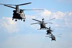 U.S. Army CH-47 Chinook and UH-60 Black Hawk helicopters conducting rescue mission in Boulder Colorado flood