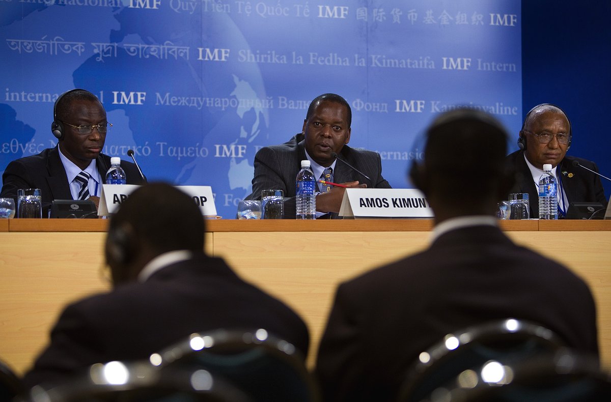 African Finance Ministers Abdoulaye Diop, Amos Kimonya, and John Benjamin holding a press conference in Singapore 2006
