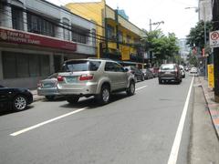 Urban street intersection at M. H. del Pilar Street and United Nations Avenue with Carlos P. Romulo Monument in Ermita, Manila