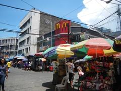 Corner of A. Bautista Street and Hidalgo Street in Quiapo, Manila with pedestrian and vehicles