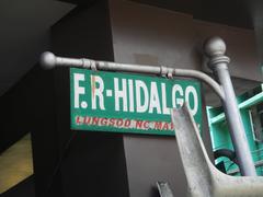 Street corner of A. Bautista Street and Hidalgo Street in Quiapo Manila with urban buildings and bustling street scene