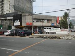 Tomas Morato Avenue beside Timog Avenue in Quezon City with streets, buildings, and greenery