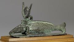Bronze Oxyrhynchus fish with horned sun-disc from Late Period-Ptolemaic Egypt