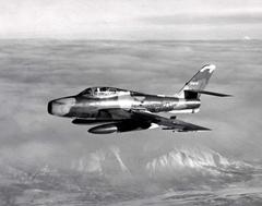 U.S. Air Force Republic F-84F-25-RE Thunderstreak fighter jet in flight with open drag chute door