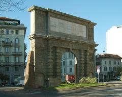 Porta Romana arch in Piazza Medaglie d'Oro, Milan under clear blue sky