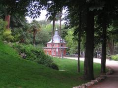 Casita del Pescador in Parque del Buen Retiro, Madrid, Spain with trees and blue sky