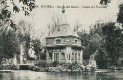 Casita del Pescador in Retiro Park Madrid with trees and water