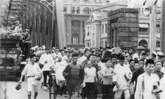 Citizens of Shanghai fleeing into Shanghai International Settlement during Battle of Shanghai in 1937