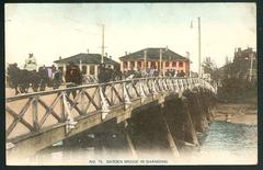 Old photograph of the Garden Bridge before 1906 with people walking on the bridge